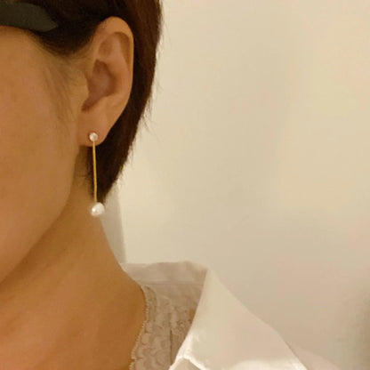 Dangling Pearl Earring WEM Support (www.WEM.support)