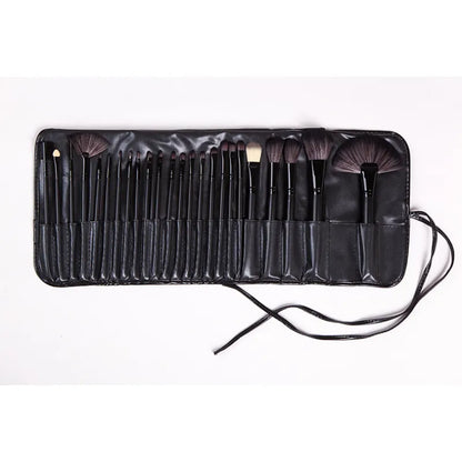A set of 24 professional makeup brushes with black handles, displayed in an open case.