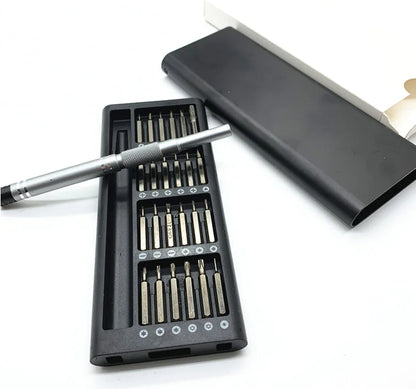 A hand holding a 25-in-1 Precision Screwdriver Set with various screwdrivers displayed in different sizes and shapes, predominantly black in color.