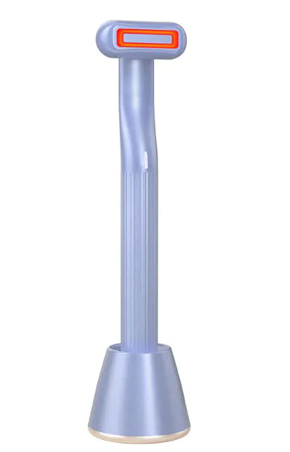 A black and pink 360° Rotary Eye & Face Massager with a rotating head and red LED light