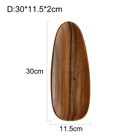 An oval-shaped, brown acacia wood snack plate with dimensions labeled, indicating 30cm by 20cm by 2cm.