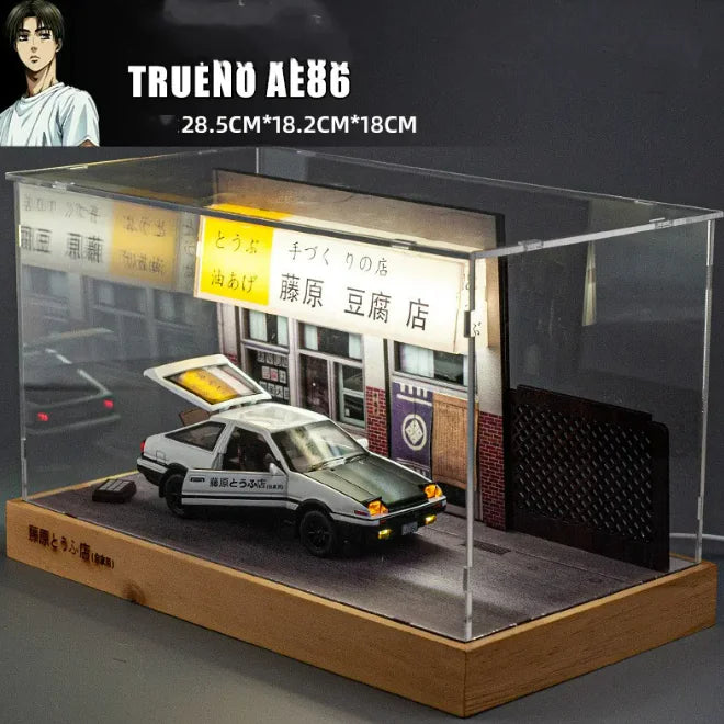 A white alloy car model displayed on a black stand, designed to resemble a real vehicle with detailed features.