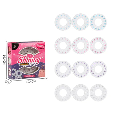 The image shows a pink and white box packaging for a Shining brand automatic DIY hair braiding machine, alongside multiple transparent circular braiding discs with decorative elements.