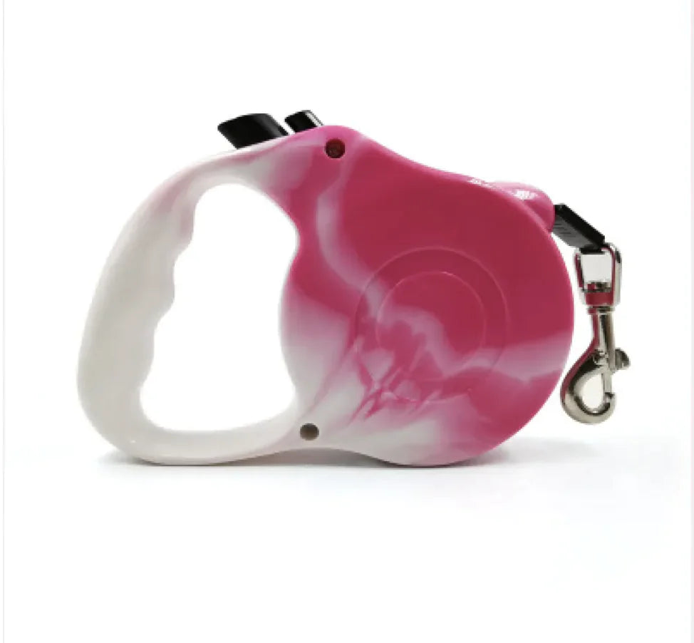 A retractable automatic dog leash with a pink and white bone pattern and a plastic handle.