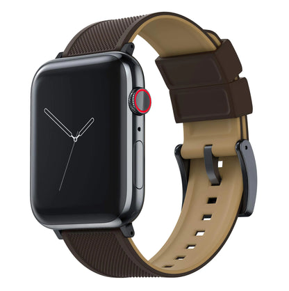 A dark brown silicone watch band with a silver metal clasp, compatible with Apple Watch models.