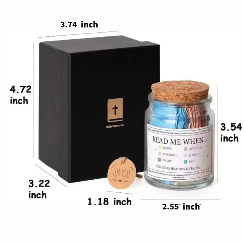 A glass jar with a gold lid containing colorful paper strips with Bible verses, labeled with different emotions such as 'Happy', 'Anxious', 'Thankful', 'Angry', 'Lonely', 'Sad'. The label 'READ ME WHEN.