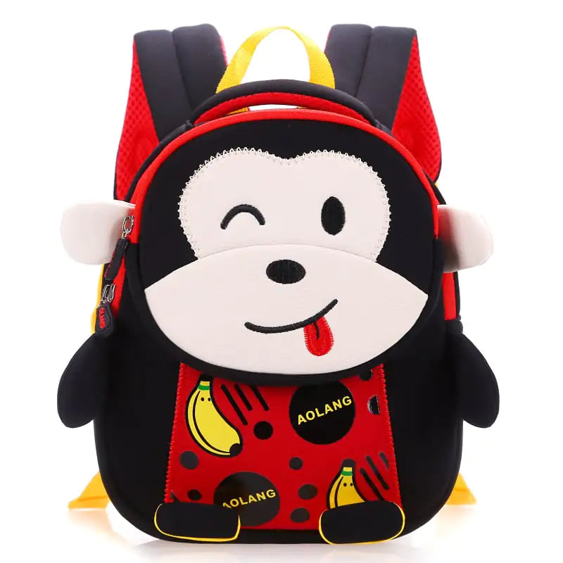 A black children's mini backpack with a cartoon monkey design, featuring yellow and gray accents and bananas as part of the design.