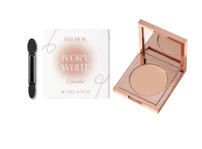 The image shows a concealer product with a compact case and a spoon applicator. The packaging is rose gold and white colored with text and product name, and the product is described as 'Ivory White'.