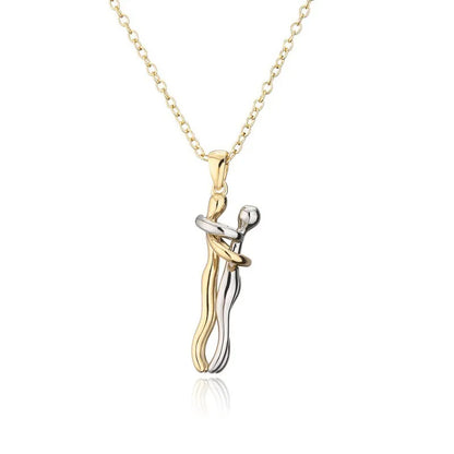 A pendant necklace with a stylized hug pendant symbolizing the connection between two loved ones.