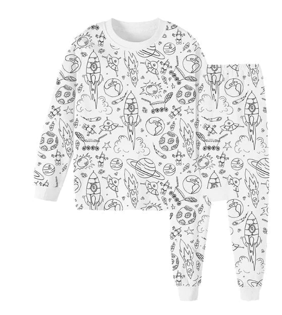 A set of white pajamas for kids with a Christmas-themed pattern, including the text 'Merry Christmas' and various Christmas-related icons in black.