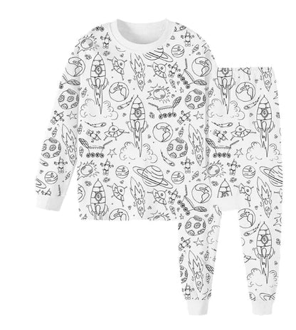 A set of white pajamas for kids with a Christmas-themed pattern, including the text 'Merry Christmas' and various Christmas-related icons in black.