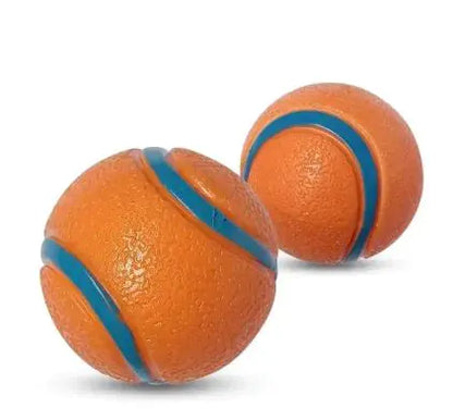 Two orange rubber dog fetch toy balls with blue stripes on a white background.