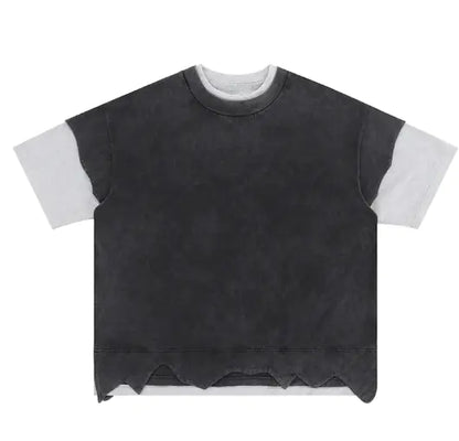A double-layered color block T-shirt with distressed detailing, featuring black and white layers.