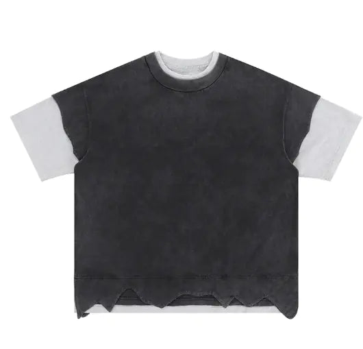 A double-layered color block T-shirt with distressed detailing, featuring black and white layers.