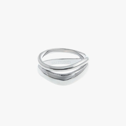 A double layered silver fashion ring with an irregular geometric design, displayed against a white background.