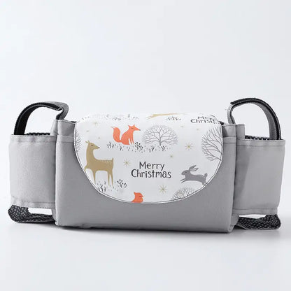 Gray baby carrier with Christmas-themed design on a white background