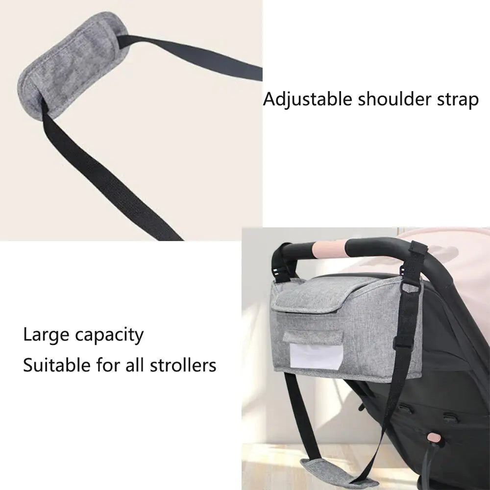 Gray diaper bag with adjustable shoulder strap and large capacity, suitable for all strollers.