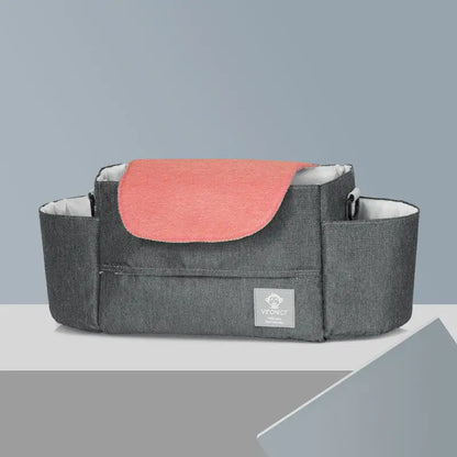 Gray and pink pet carrier on a gray background