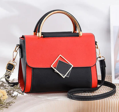 A two-tone elegant sling bag with blue and beige colors, featuring a leather-like texture, a structured design, and a metallic buckle.