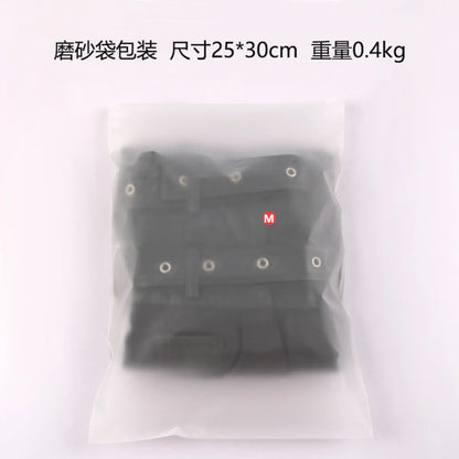 A packaged gothic skirt with pleated design shown through a clear plastic bag, with the brand label 'M' visible on the clothing.