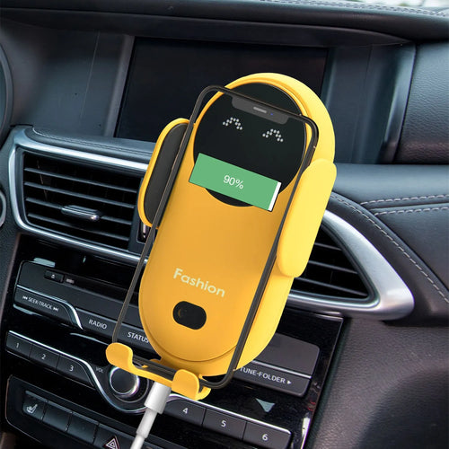 A yellow fast charging car wireless mobile phone charger mounted in a car's dashboard with a smartphone displayed on the holder.