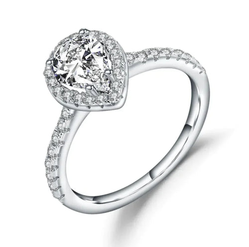 A sterling silver ring with a central diamond inlay surrounded by smaller gemstone inlays on the band.