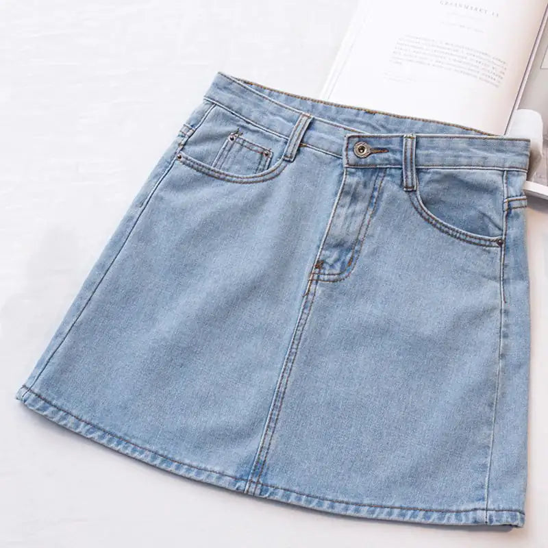 A high-waisted A-line denim skirt in light blue color, displayed against a neutral background.