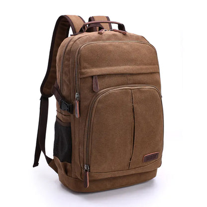 A green canvas backpack with multiple compartments and brown leather accents, designed for men and women.
