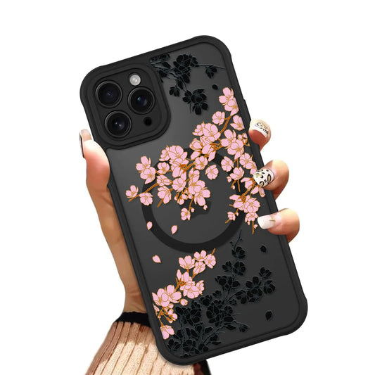 A hand holding a black iPhone 11 Pro Max case with a translucent floral flowers design on the back.