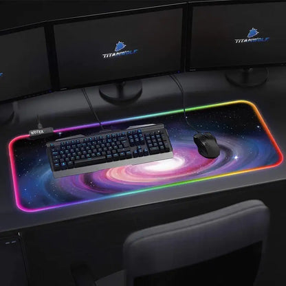 An oversized luminous mouse pad with RGB lighting, featuring a light switch button, USB interface, and a 1.8m USB braided cable.