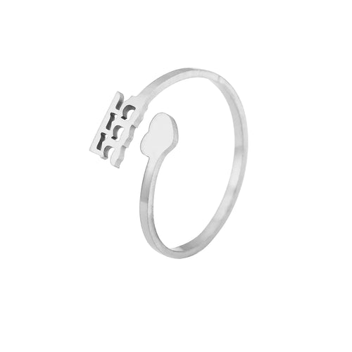 A silver-colored personalized stainless steel ring with a creative number design on the top part, displayed against a white background.