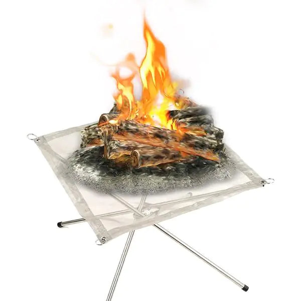 A portable outdoor fire pit and BBQ grill made of metal and wood, placed on a grassy surface.