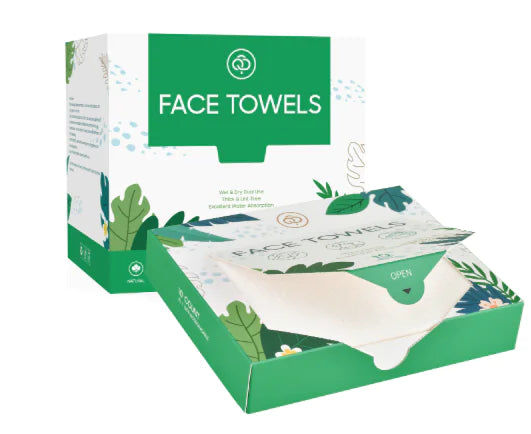 A box of portable travel disposable face wipes with packaging that has green accents and information windows displaying the product name and features.