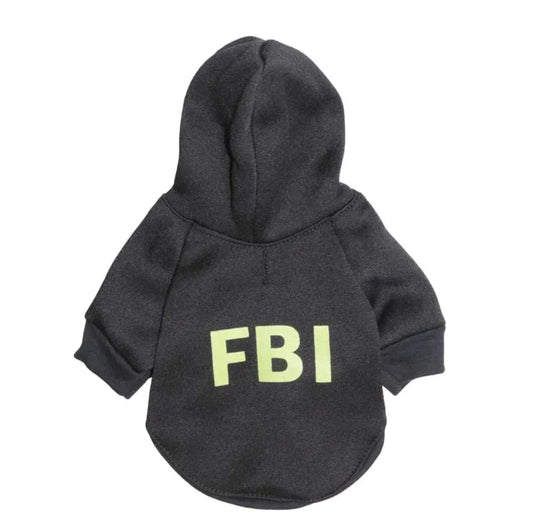 A dark-colored pet hoodie with 'FBI' printed in yellow letters on the back.