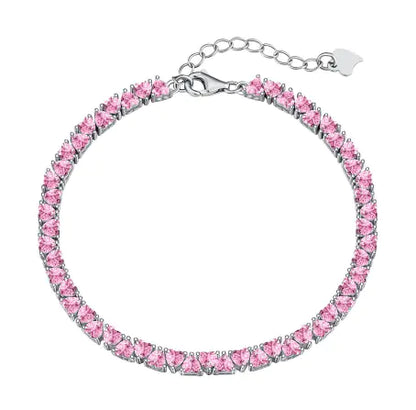 A sterling silver hip hop bracelet with pink zircon stones, featuring a secure clasp and a lustrous finish.