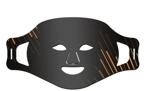 A black silicone face mask with cut-outs for the eyes and nose, featuring gold accents on the design.