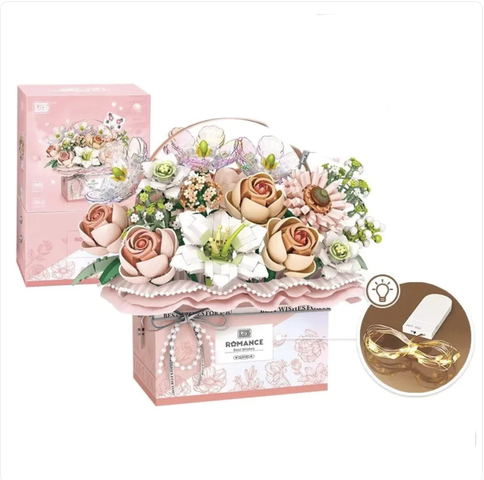 A Small Particle Building Blocks Set featuring a floral design with predominantly pink and white components, packaged in a box with a matching design.