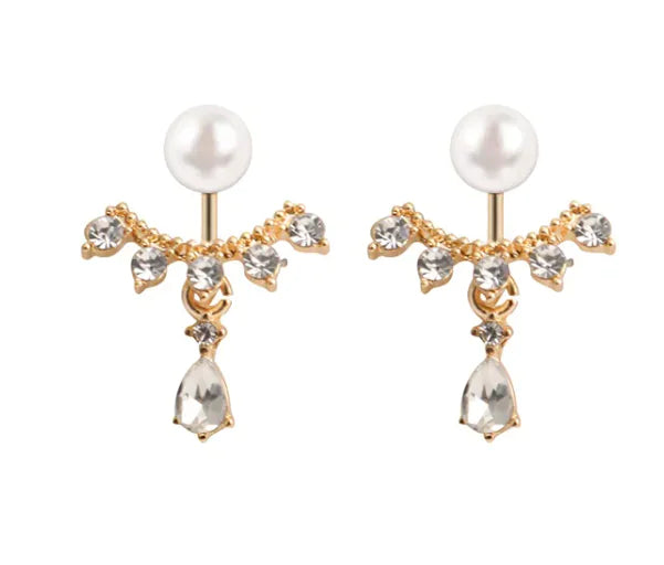 A pair of gold-colored hoop earrings with a matte frosted texture, featuring clear crystals and pearls.