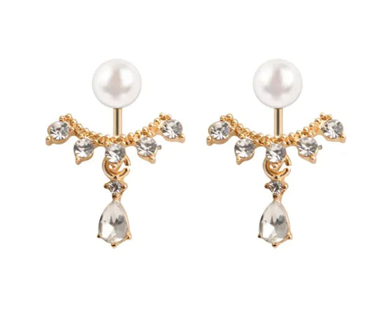 A pair of gold-colored hoop earrings with a matte frosted texture, featuring clear crystals and pearls.