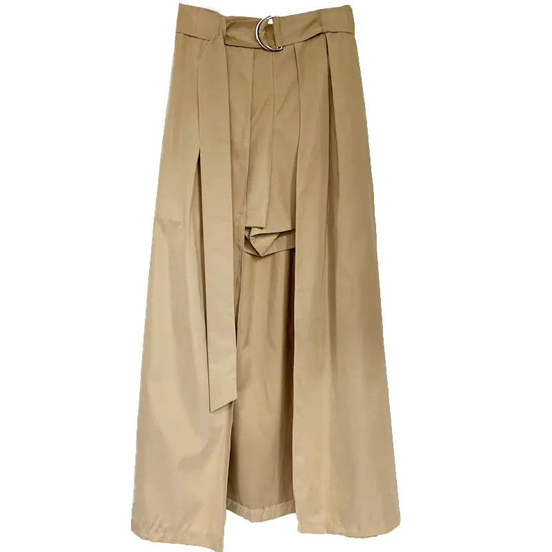 A mid-length beige skirt with a high waist and irregular hemline, designed for summer wear.