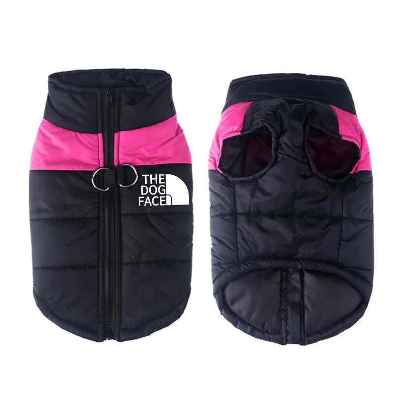 A waterproof winter pet coat with pink and black colors, featuring a zippered front and the brand 'The Dog Face' displayed on the chest.