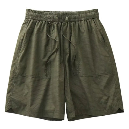 A pair of creamy white, knee-length men's summer sports shorts with a casual waistband and straight cut.