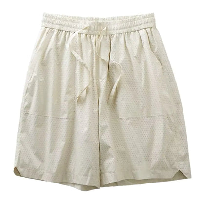 A pair of creamy white, knee-length men's summer sports shorts with a casual waistband and straight cut.