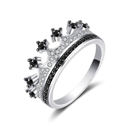 A two-tone heart-shaped zircon ring with gold-plated inlaid artificial gemstones on a white background.