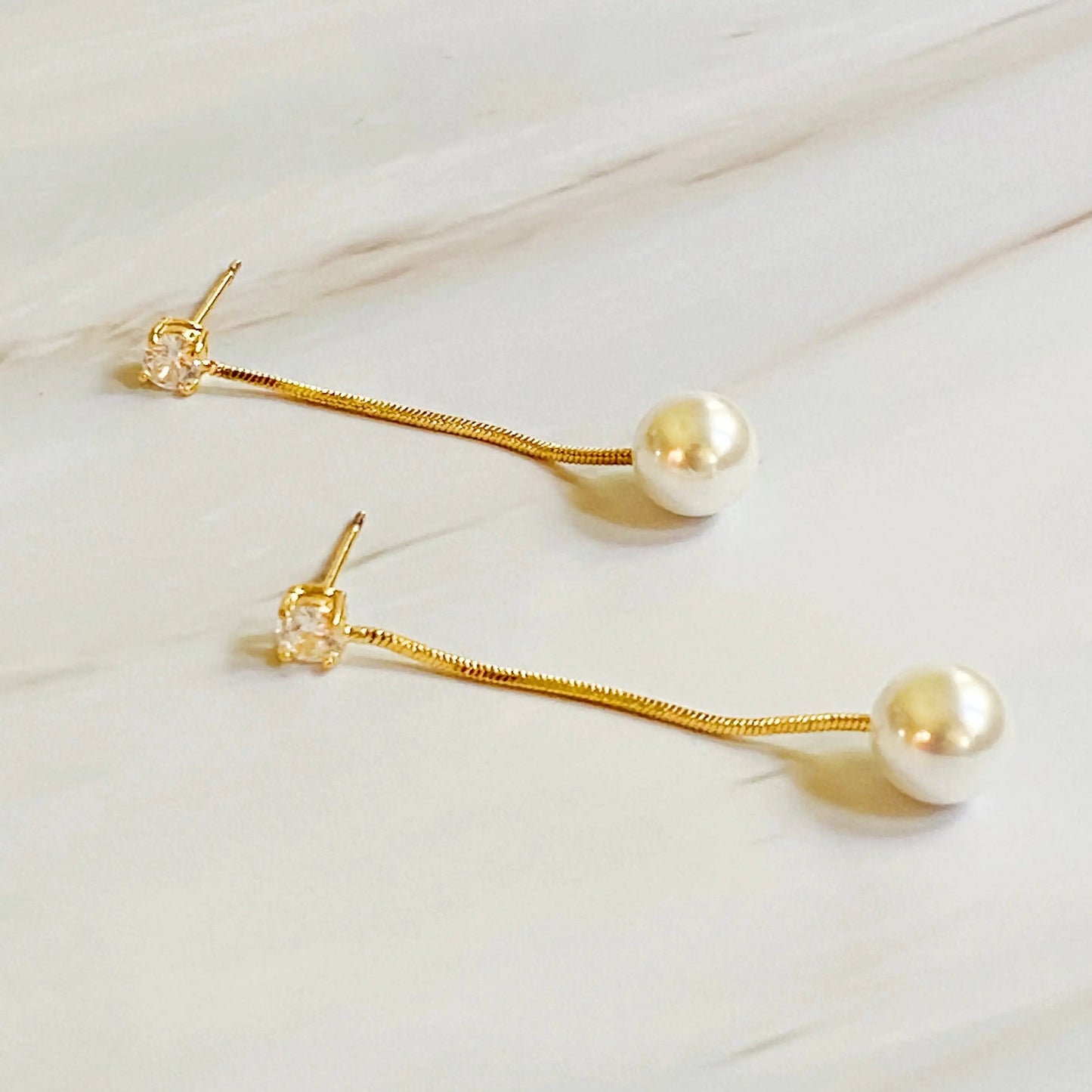 Dangling Pearl Earring WEM Support (www.WEM.support)