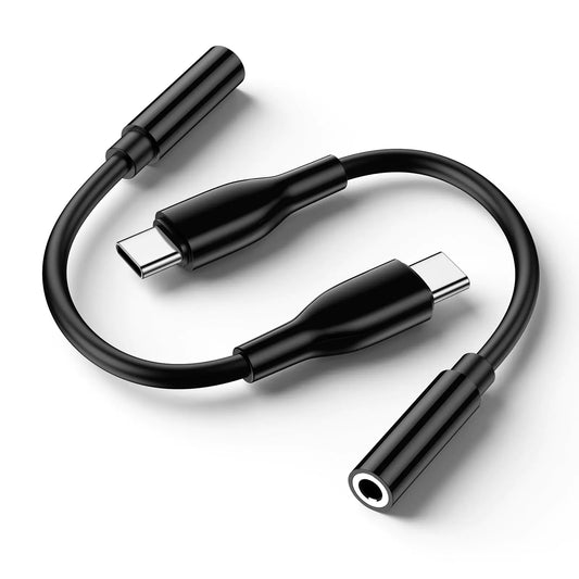 A black USB C to 3.5mm headphone adapter with a coiled design and multiple adapter ports.