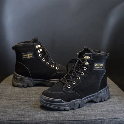 A pair of beige, short snow boots with lace-up closure and a flat heel, designed for women.