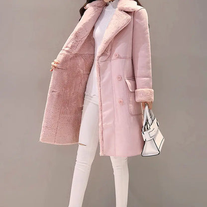 Two women modeling long lambswool coats in light gray and light pink colors, featuring a lapel collar and long sleeves.