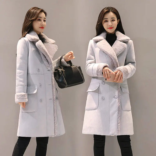 Two women modeling long lambswool coats in light gray and light pink colors, featuring a lapel collar and long sleeves.