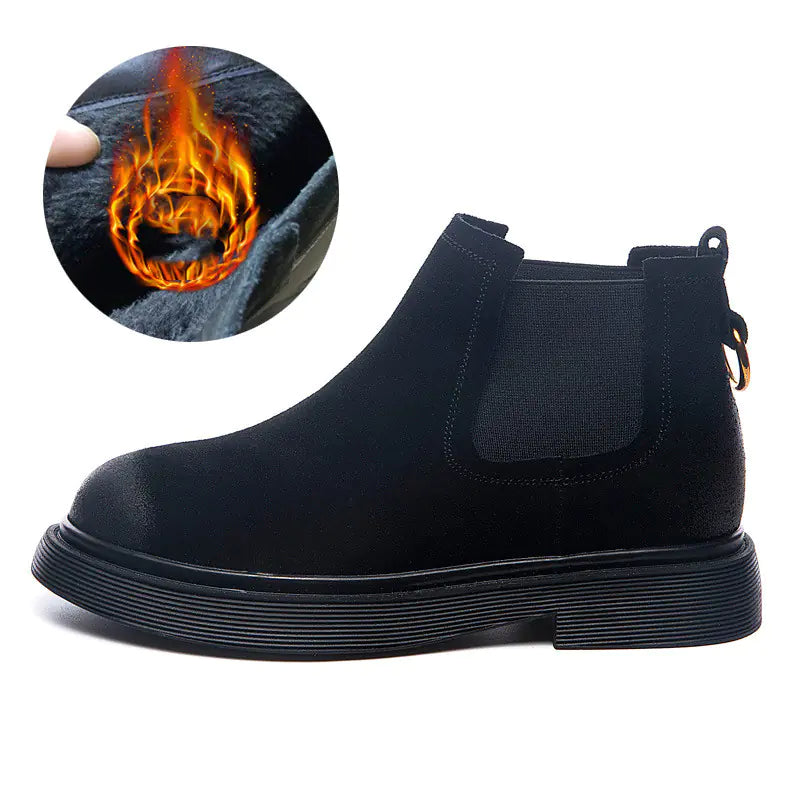 A black leather chunky ankle boot with a side zipper and a flat sole.